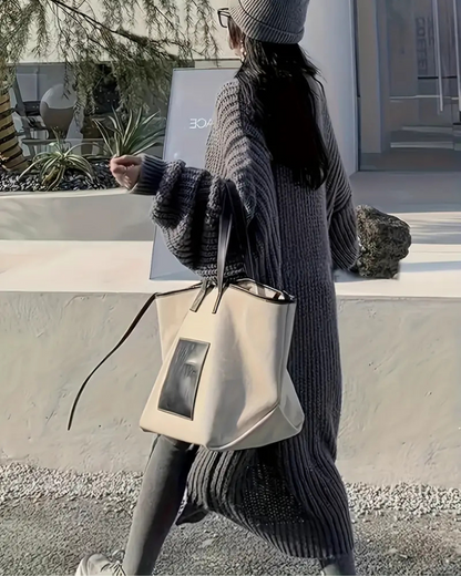 Abrigo largo para mujer con estilo abierto y bolsillos frontales